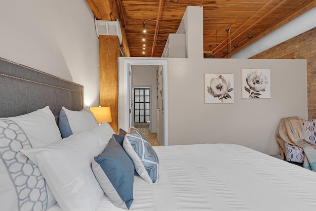 bedroom with wooden ceiling