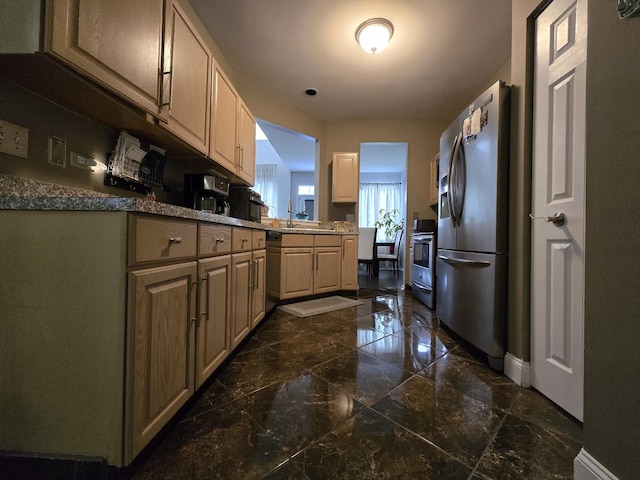 kitchen with appliances with stainless steel finishes and sink