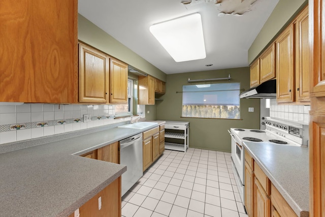 kitchen with light tile patterned floors, white electric range oven, tasteful backsplash, dishwasher, and sink