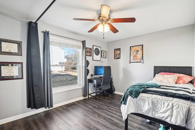 bedroom featuring dark wood-type flooring and ceiling fan