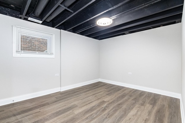 basement featuring wood-type flooring