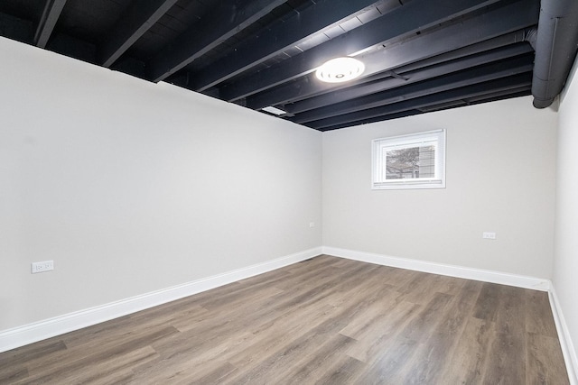 basement with wood-type flooring