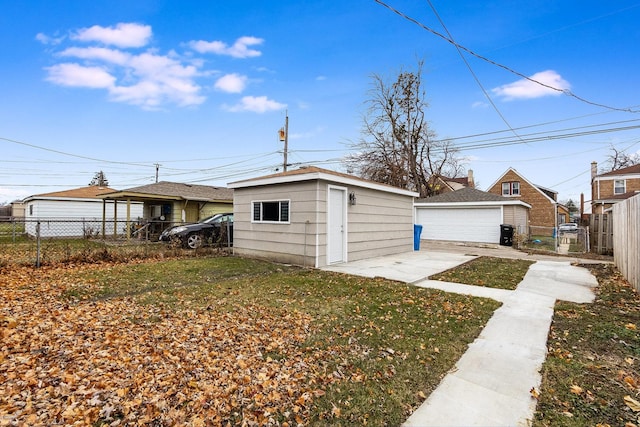 exterior space with a garage and a yard