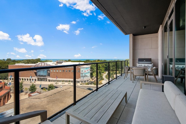 balcony featuring area for grilling