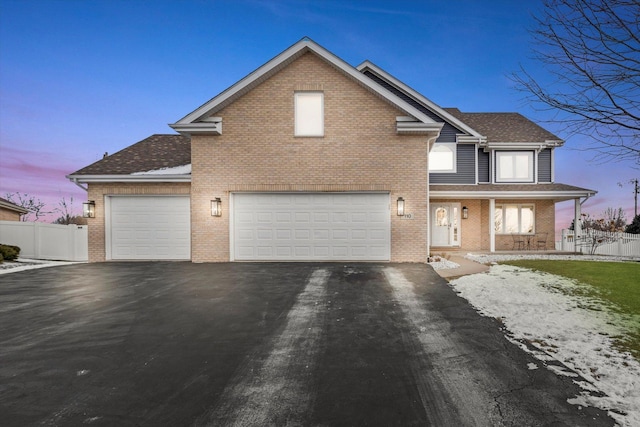 front of property featuring a garage