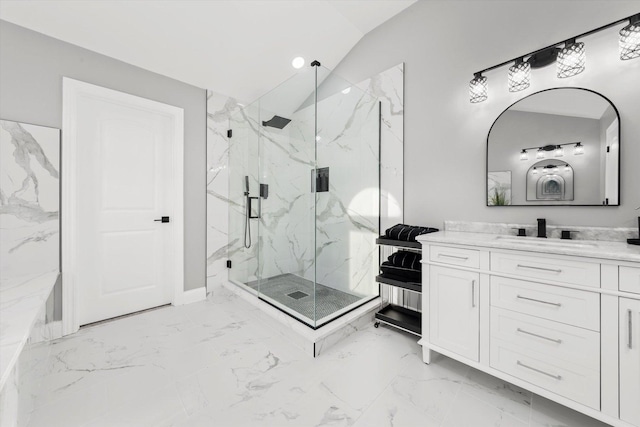 bathroom featuring vanity, an enclosed shower, and vaulted ceiling