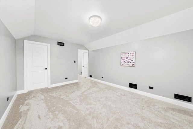 interior space featuring light colored carpet