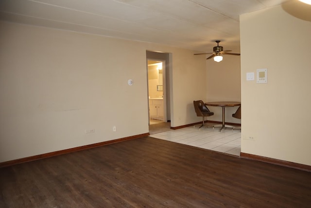 spare room with ceiling fan and light hardwood / wood-style flooring