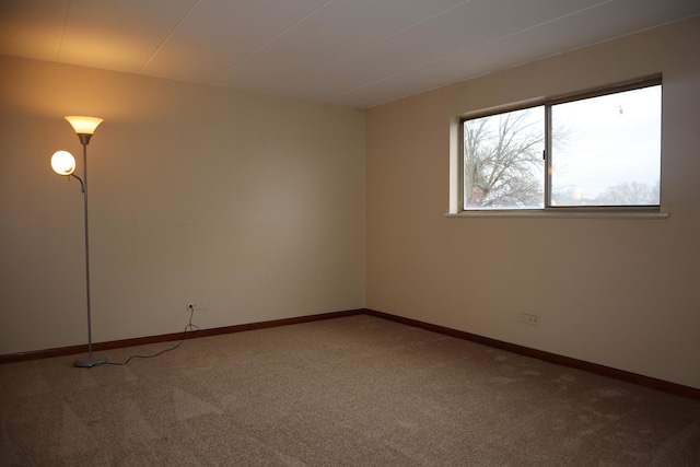 empty room featuring carpet flooring