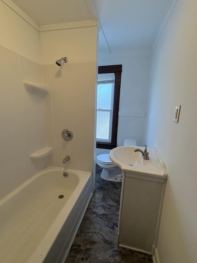 full bathroom with vanity, ornamental molding, toilet, and washtub / shower combination