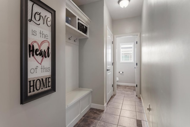 mudroom with tile patterned flooring