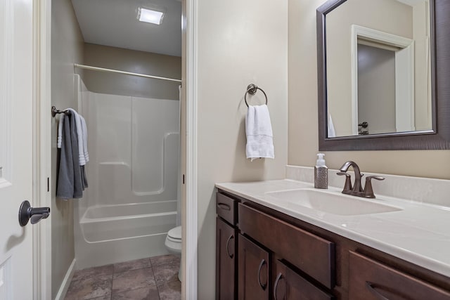 full bathroom with toilet, shower / bathing tub combination, and vanity