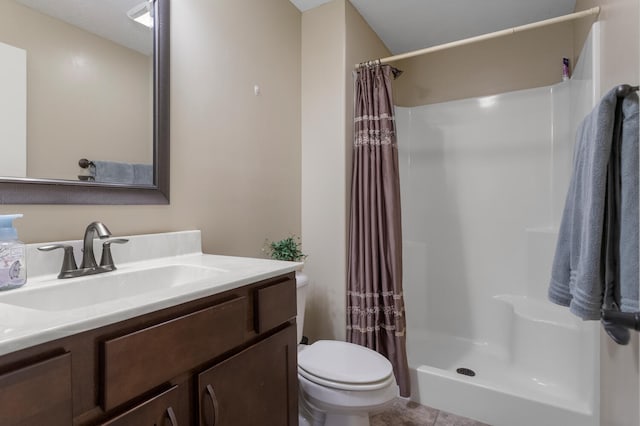 bathroom with toilet, tile patterned floors, a shower with shower curtain, and vanity