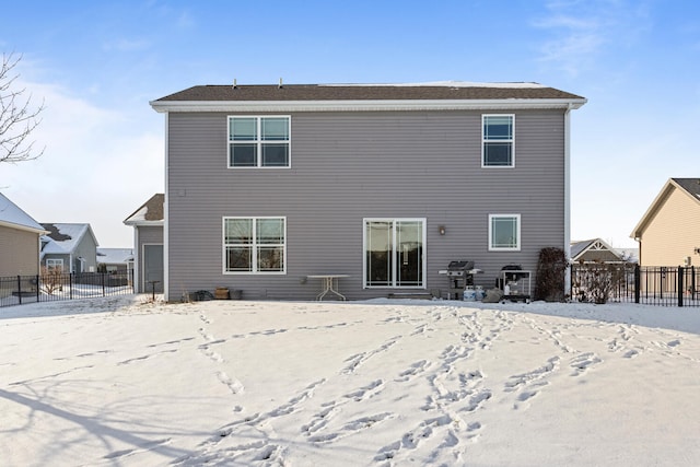 view of snow covered property