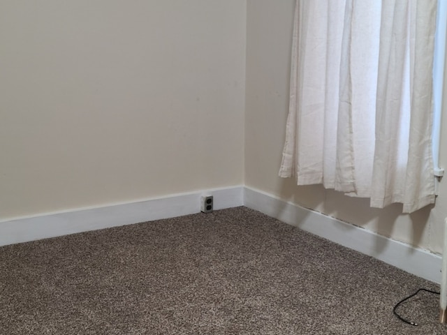 407 E Walnut St, Oglesby, IL 61348 - empty room featuring carpet floors and baseboards
