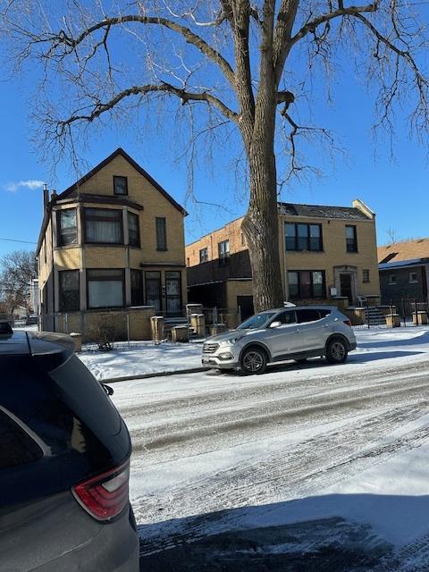 view of snow covered property