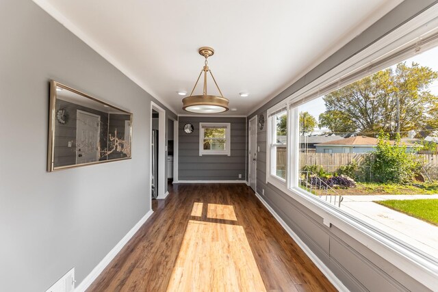 bonus room with lofted ceiling and light hardwood / wood-style floors