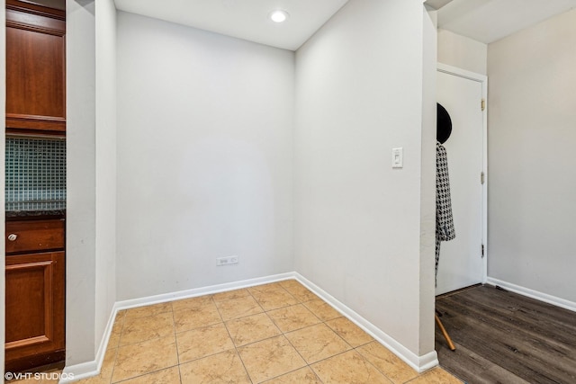 interior space with light tile patterned floors