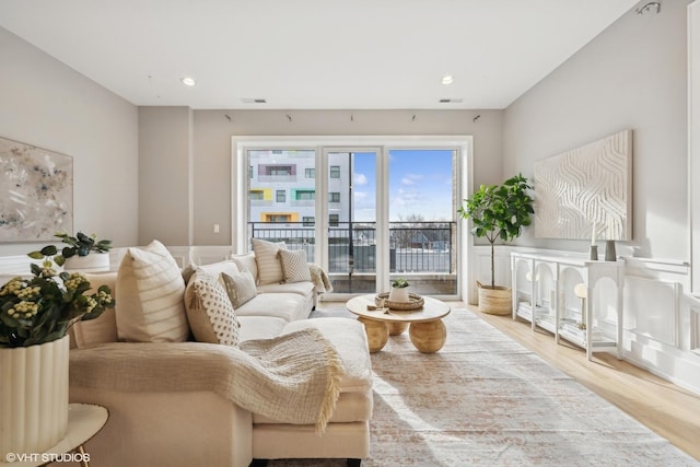 living room featuring light wood-type flooring