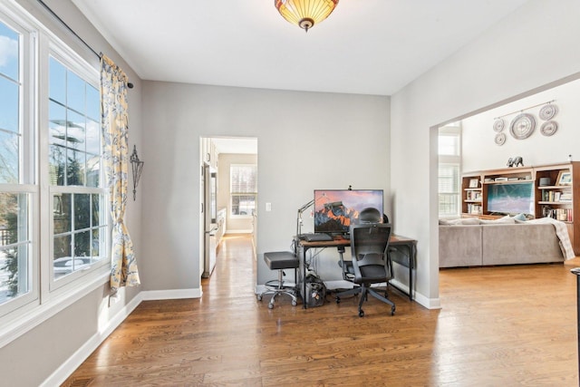 office area with hardwood / wood-style flooring