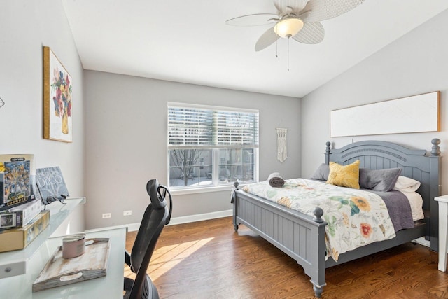 bedroom with lofted ceiling, dark wood-type flooring, and ceiling fan