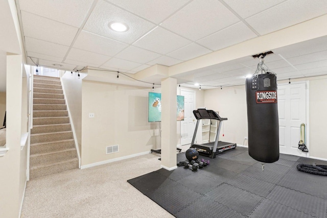 exercise area with a drop ceiling