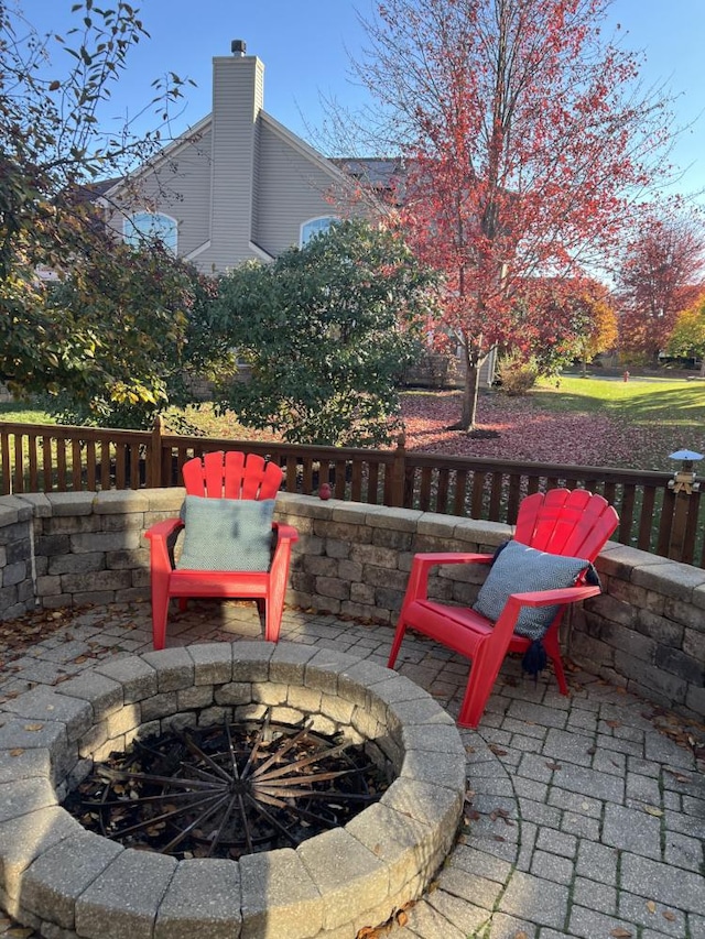 view of patio / terrace featuring a fire pit