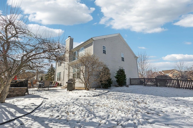 view of snow covered property