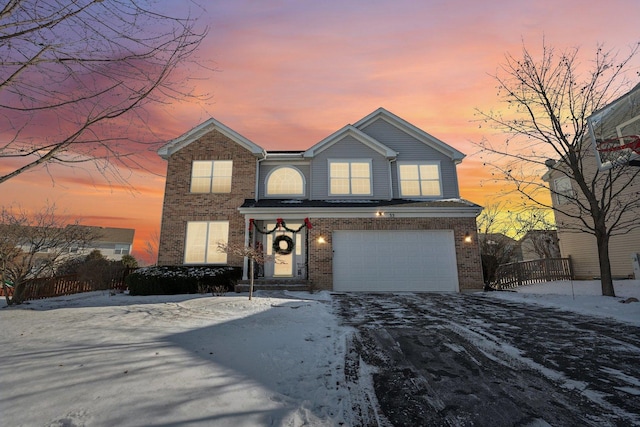 front of property featuring a garage