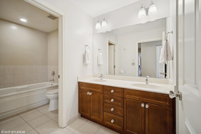 full bath with a garden tub, visible vents, a sink, and tile patterned floors