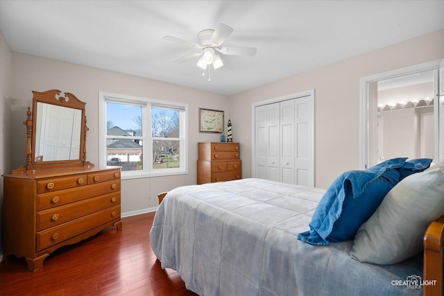 bedroom with a closet, ceiling fan, and dark hardwood / wood-style floors