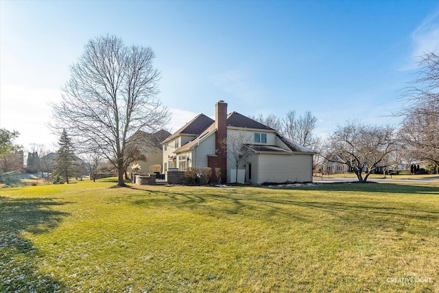 view of property exterior featuring a lawn