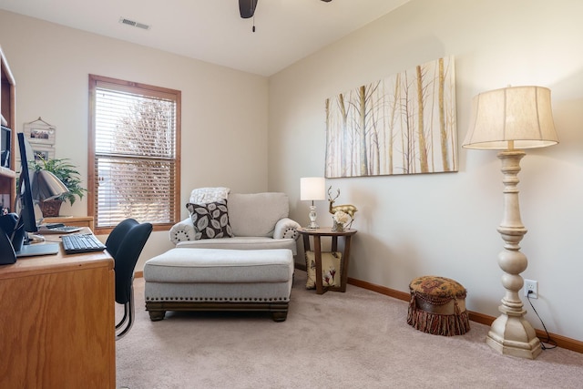 office area with ceiling fan and light colored carpet