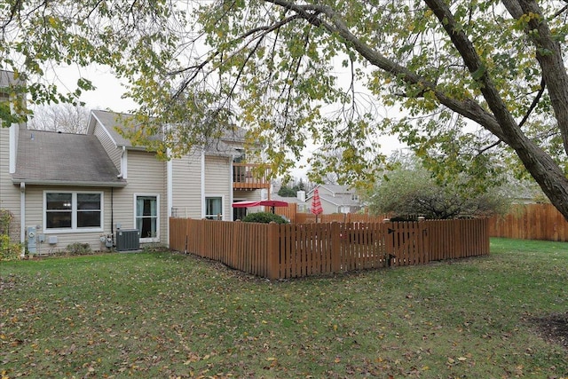 view of yard featuring central AC