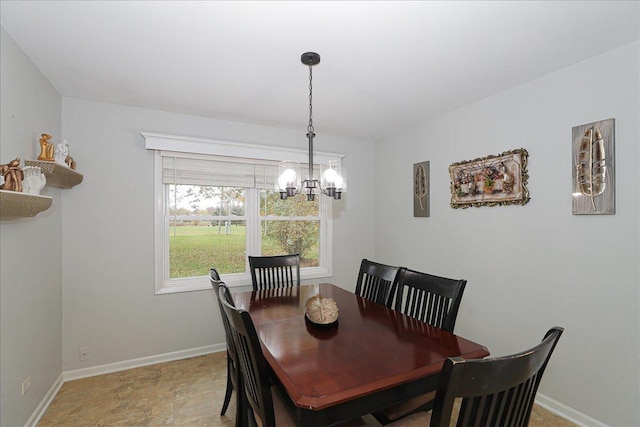 dining room featuring an inviting chandelier