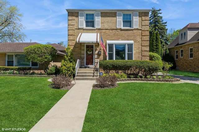 view of front property with a front lawn