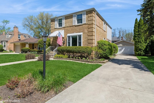 view of front of house with a garage, an outdoor structure, and a front yard