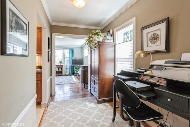 office space featuring ornamental molding and plenty of natural light