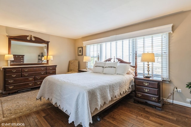 bedroom featuring dark hardwood / wood-style flooring