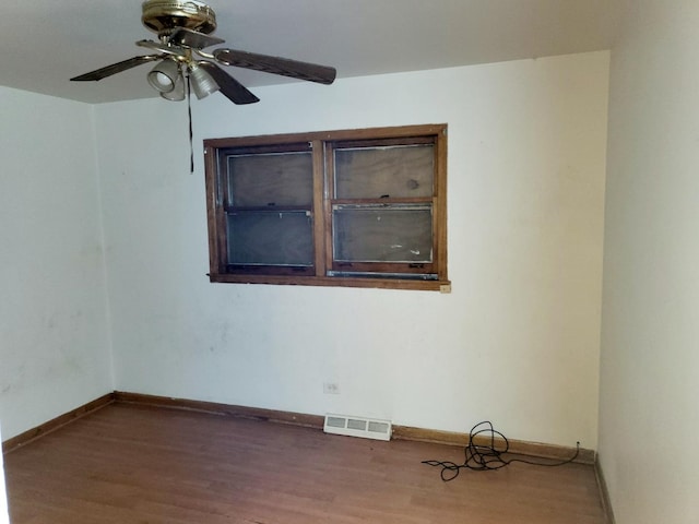 unfurnished room featuring ceiling fan and wood-type flooring