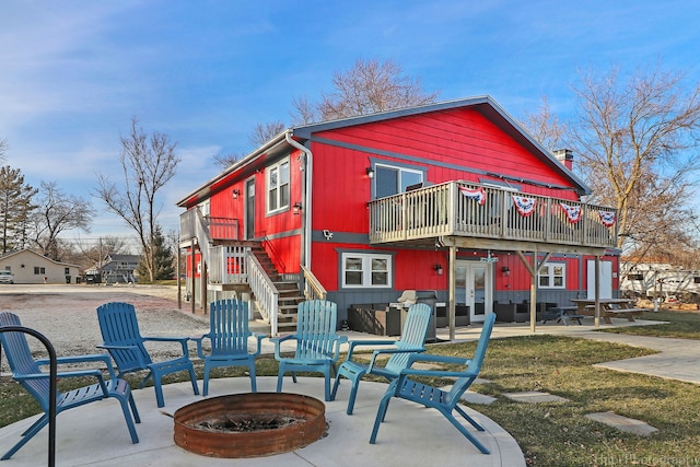 26048 W Forest Ave, Antioch, IL 60002 - rear view of property with an outdoor fire pit, french doors, and a patio