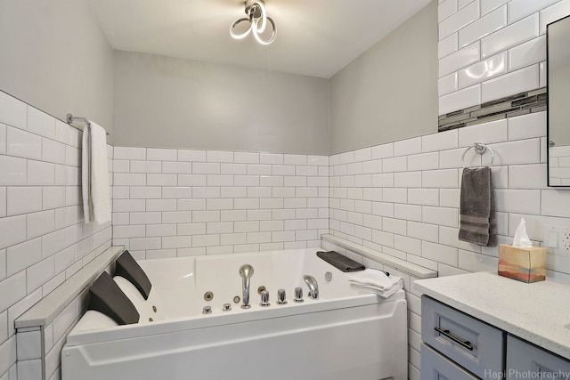 bathroom featuring tile walls and a bathtub