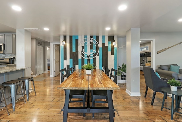 dining room with light hardwood / wood-style floors