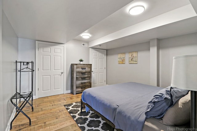 bedroom featuring light hardwood / wood-style floors