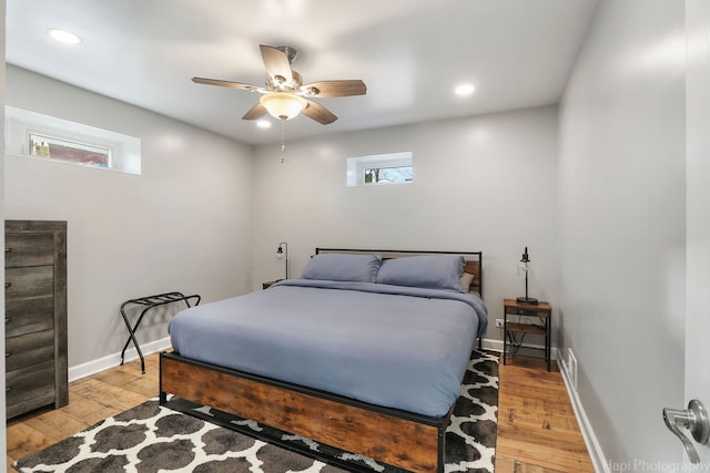 bedroom featuring ceiling fan and light wood-type flooring