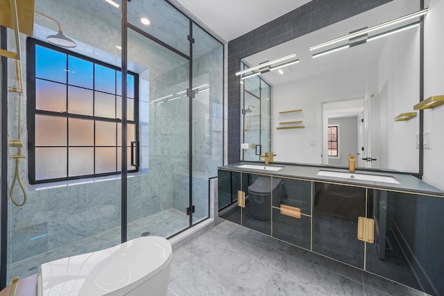 bathroom featuring toilet, an enclosed shower, and vanity