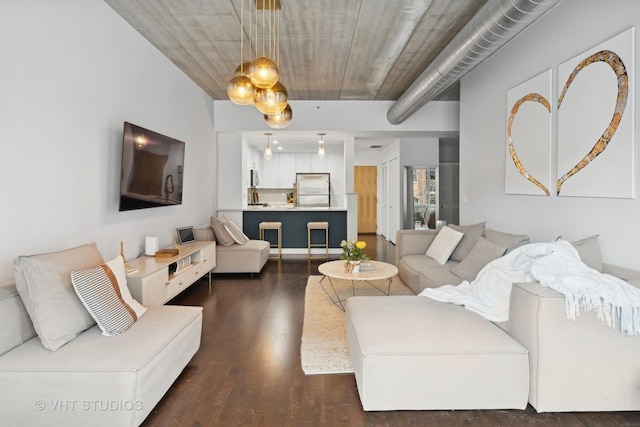 living room featuring dark hardwood / wood-style floors