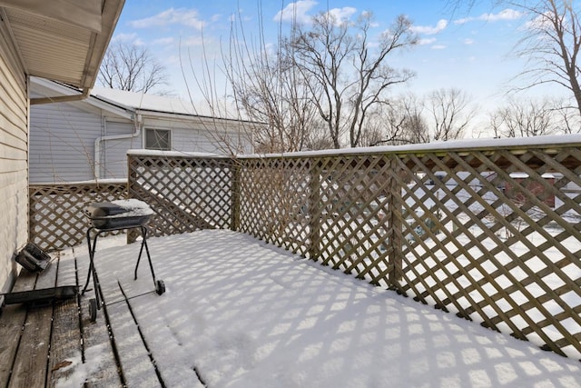 view of snow covered deck