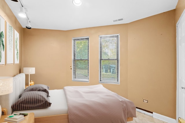 bedroom with track lighting