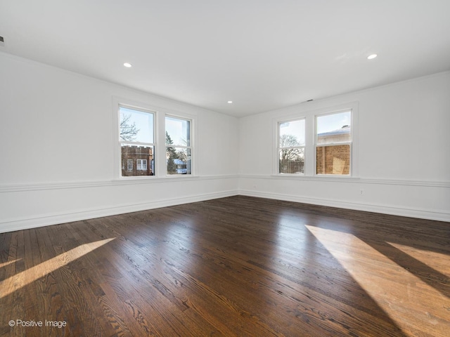 unfurnished room featuring dark hardwood / wood-style floors